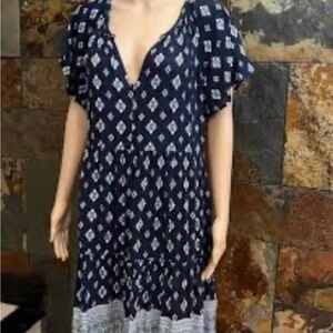 Knox Rose bohemian-style tiered mini dress featuring a patterned